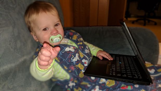 Kid playing computer